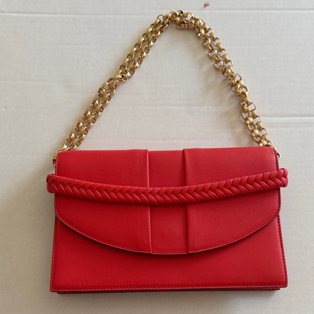Kneed Coco clutch orange